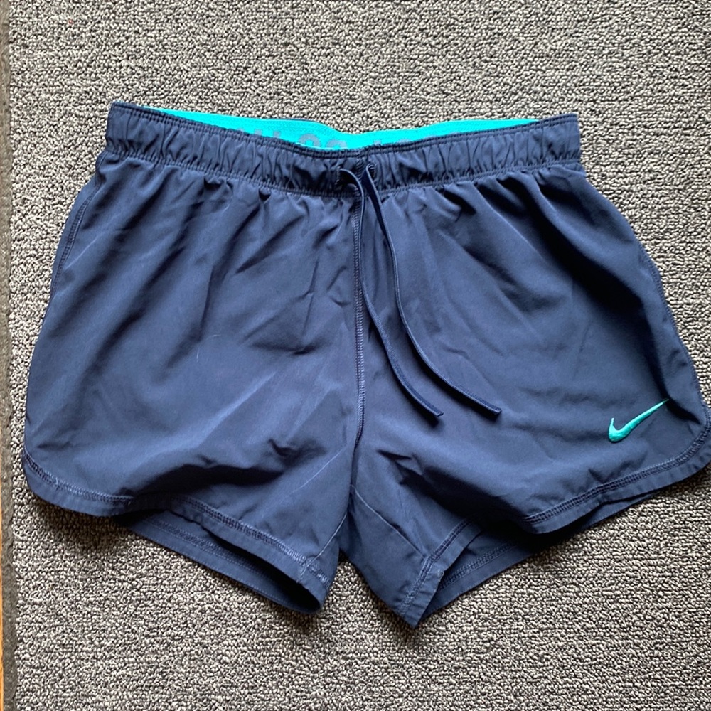 Women’s Nike running shorts with built in spandex size XS good condition